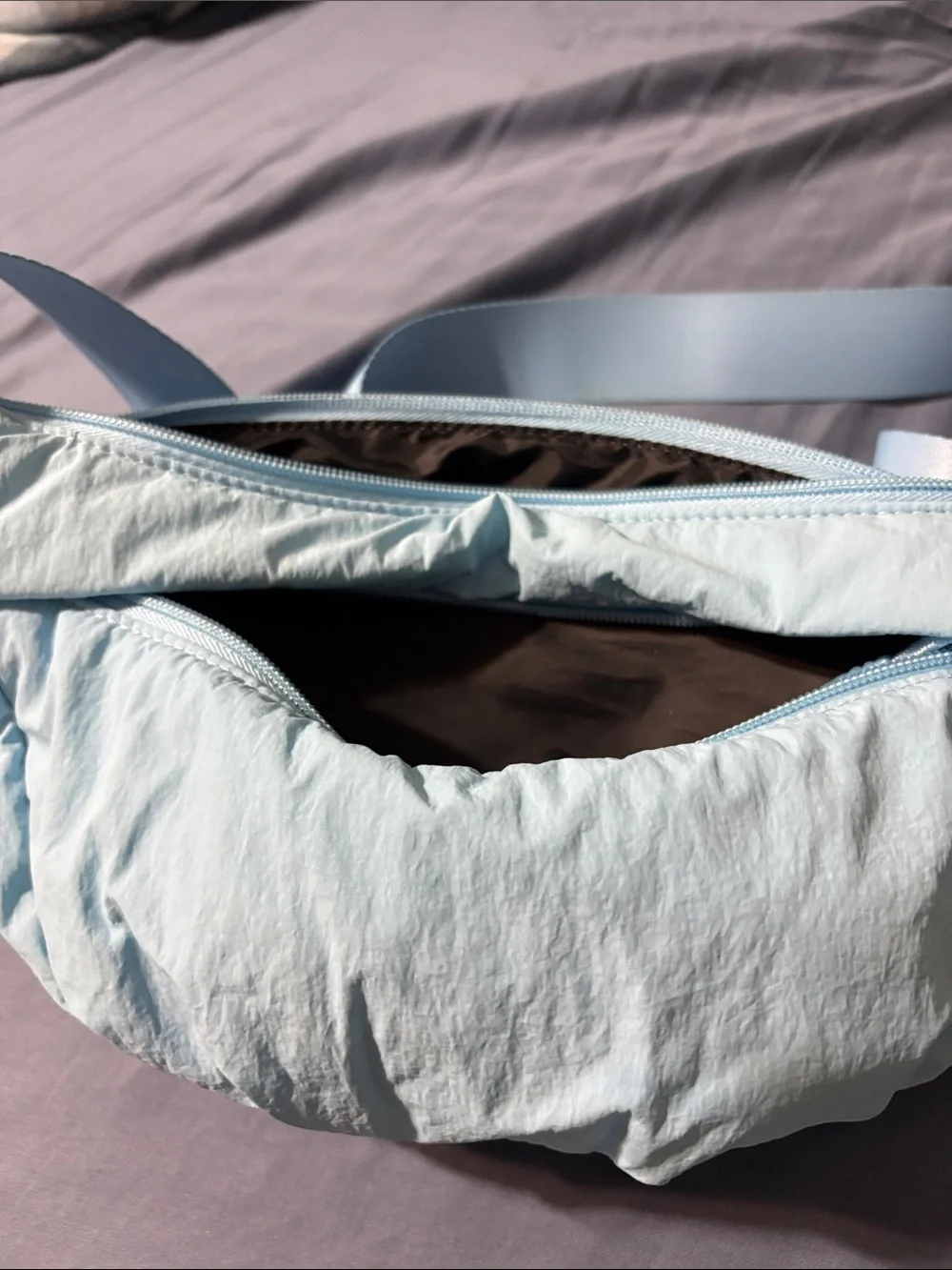 Light Blue never used Women's Crossbody Sling Bag by all in motion. Nice
